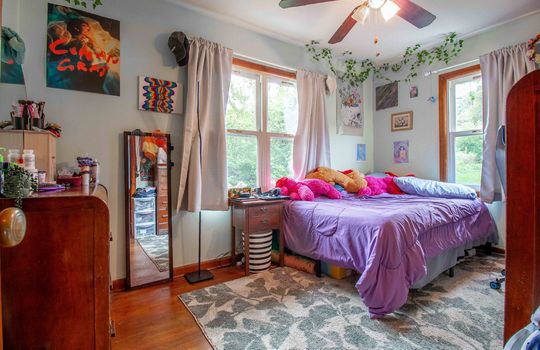 bedroom, hardwood flooring, ceiling fan window