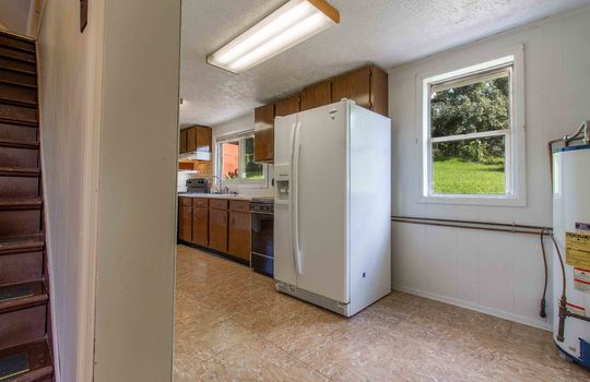 kitchen, water heater, refrigerator, dishwasher, sink, cabinets