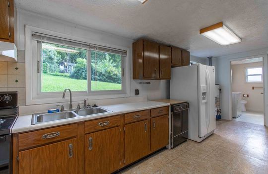 kitchen, refrigerator, dishwasher, sink, stove, cabinets, window