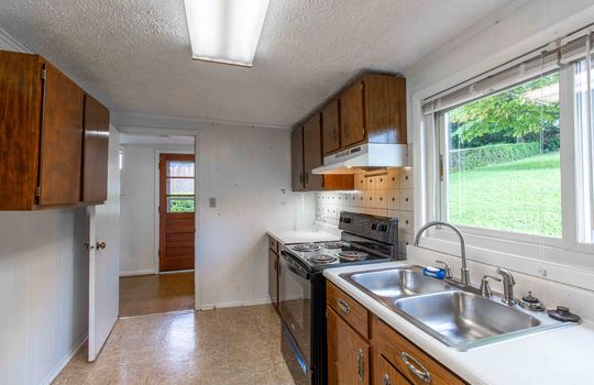 kitchen, stove, sink, window, cabinets, countertops