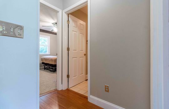 hallway into bedrooms and baths