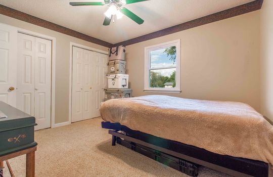 bedroom, window ceiling fan, closets