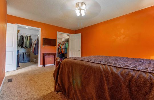 primary bedroom, carpet, double walk-in closet