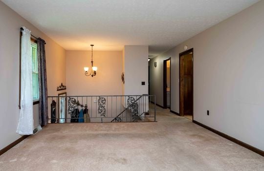 living room, foyer entrance, carpet, hallway