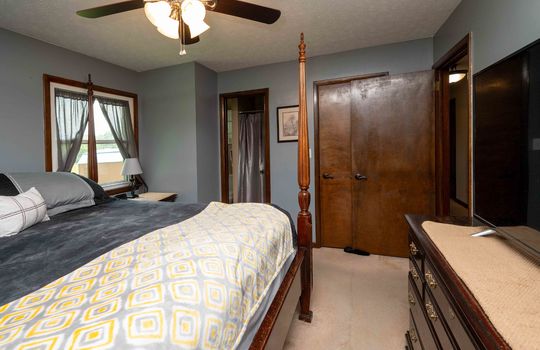 primary bedroom, primary bath, carpet, ceiling fan, closet