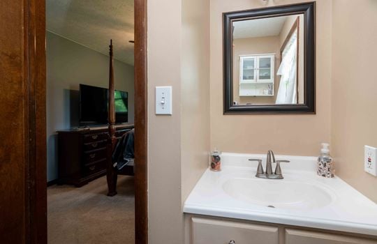 bathroom, sink, view into bedroom