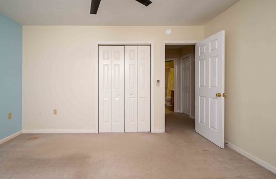 bedroom, ceiling fan, carpet, closet