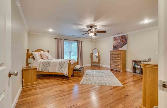 bedroom, hardwood flooring, ceiling fan, windows