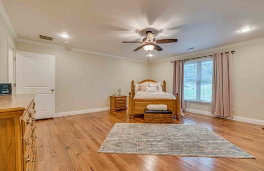 bedroom, ceiling fan, hardwood flooring, window