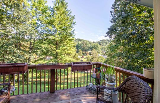 wood back deck, back yard, trees, mountain views