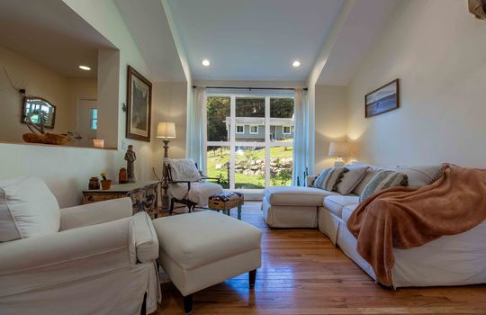 living room, windows, ceiling fan, hardwood flooring, vaulted ceilings, recessed lighting