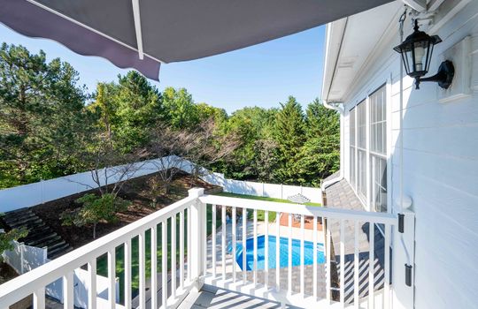 level 3 balcony, awning, back yard view, trees, inground pool view