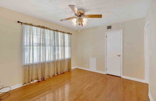 bedroom, ceiling fan, closet, hardwood flooring