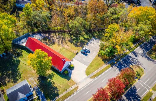 Aerial view, doggy day care, 1.5+/- acres, 13 parking spaces, dog runs