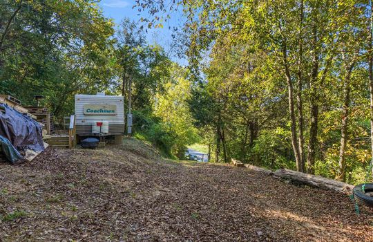 15.5 +/- acres of land, wooded, campground, second camper spot