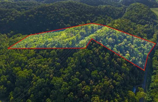 aerial view of property, 15.5 +/- acres of land, wooded, campground, property outline