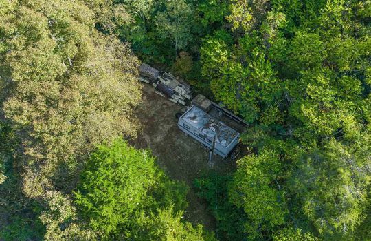 camper spot, aerial view of property, 15.5 +/- acres of land, wooded, campground