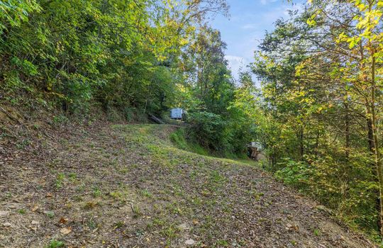 15.5 +/- acres of land, wooded, campground