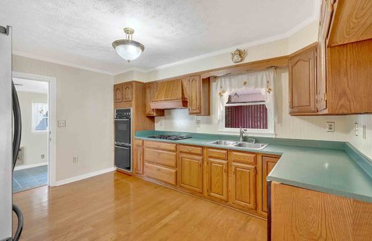kitchen, counters, cabinets, double oven, sink, refrigerator