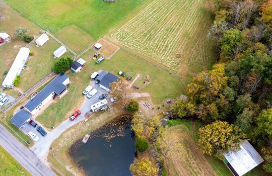 aerial view of land, 5.26+/- acres, pond, field, home, driveway