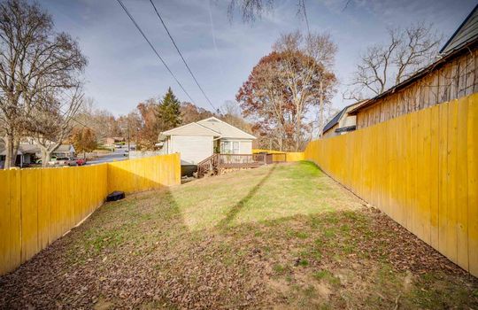 fenced back yard, back deck, back door, cottage