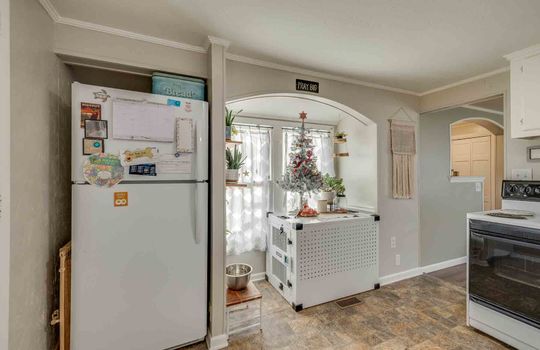 kitchen, eat in kitchen nook, laminate flooring, refrigerator