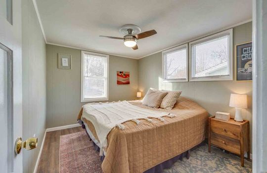 bedroom, laminate flooring, ceiling fan, windows