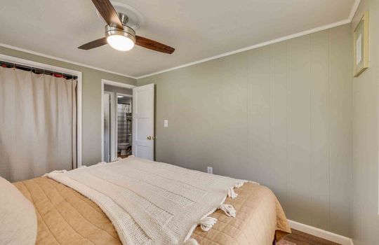 bedroom, ceiling fan, closet, door to hallway