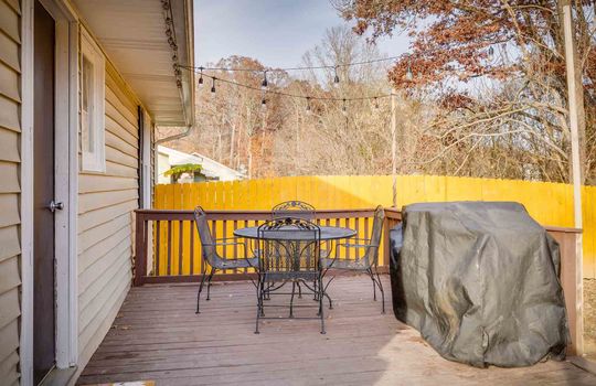 back deck, cottage, vinyl flooring, fenced back yard