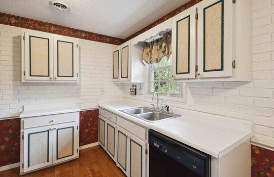 kitchen, hardwood flooring, cabinets, countertops, sink, dishwasher