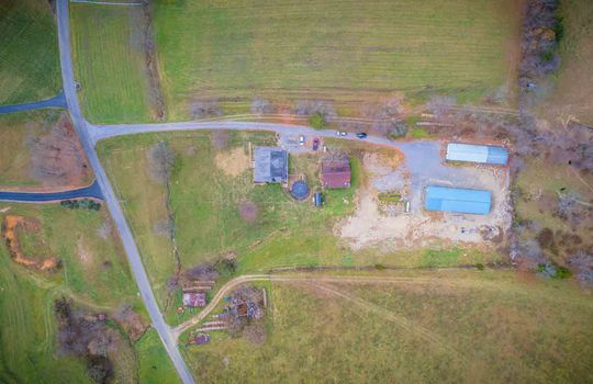 aerial view of road, gravel drive 1.94+/- acres, two buildings