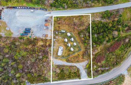 aerial view, commercial property, 1.01+/- acre lot, road frontage, parking lot, property outline