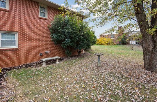 Brick ranch, side view, yard, trees, landscaping