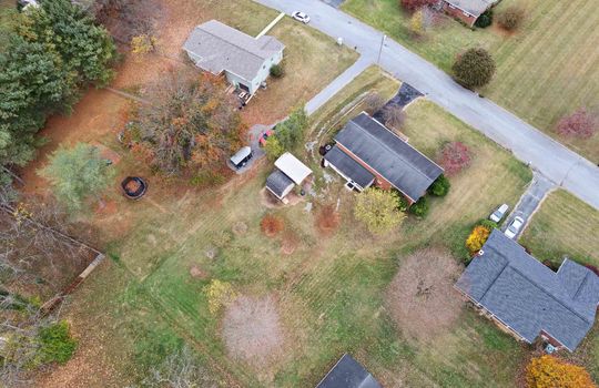 aerial view from back of property, neighboring properties, road, driveways