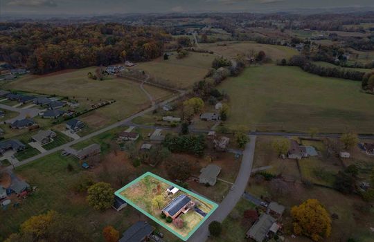 Aerial view of property with property outline