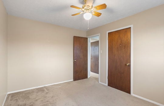 bedroom, ceiling fan, closet, carpet
