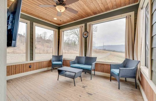 screened porch, ceiling fan, wood ceilng,