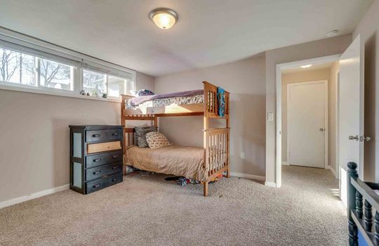 lower level, fourth bedroom, carpet, windows, closets