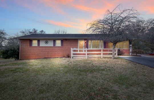 brick ranch, one level, front yard, twilight photo