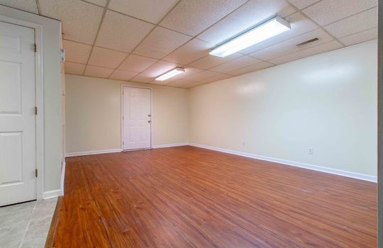 unit 4 living room, drop ceiling, laminate flooring