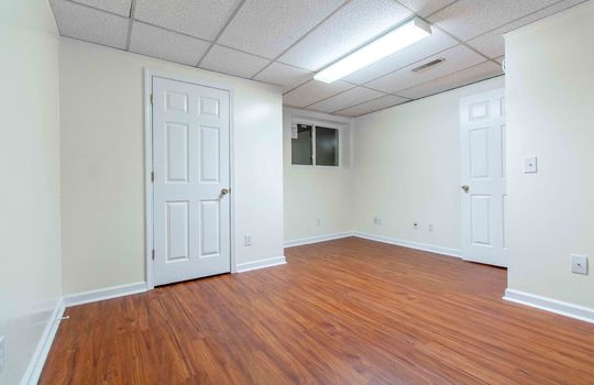 bedroom 2, unit 4, drop ceilings, laminate flooring