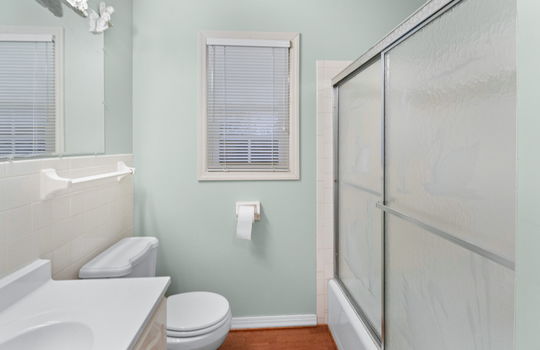 bathroom, freshly painted, sink, toilet, shower/tub, sliding shower door