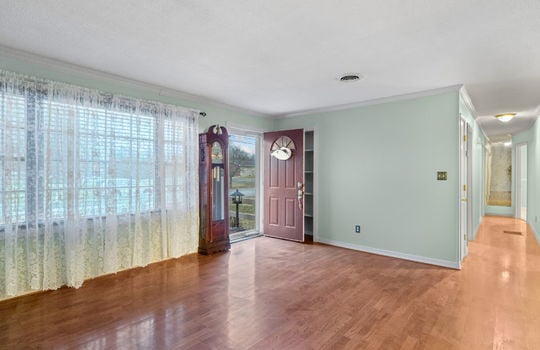 freshly painted living room, hardwood flooring