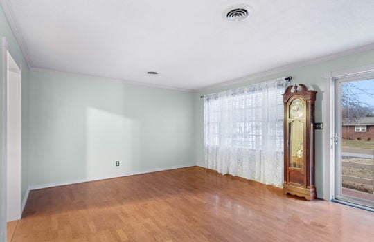 freshly painted living room, hardwood flooring