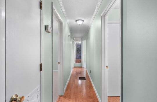 freshly painted hallway, hardwood flooring