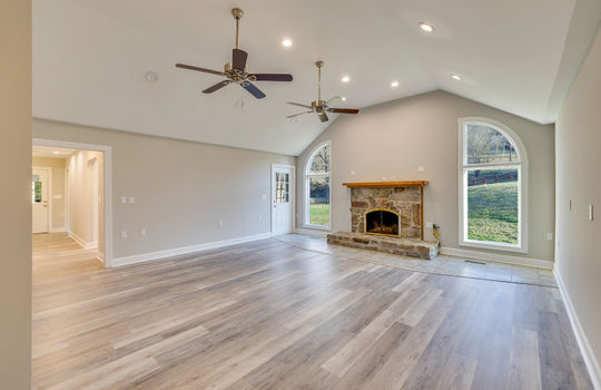 living room, recessed lighting, ceiling fans, fireplace, luxury vinyl plank flooring