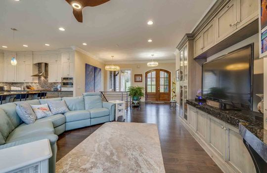 living room, front door, hardwood flooring, recessed lighting, ceiling fan
