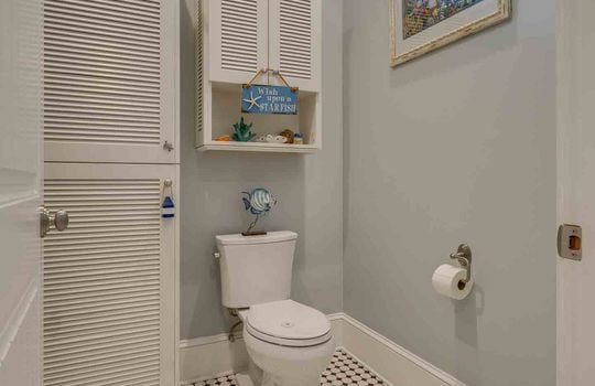 bathroom, toilet, tile flooring