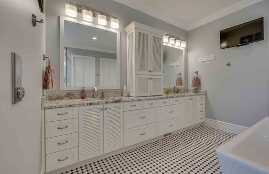large double sink vanity, linen cabinets, cabinets, counters