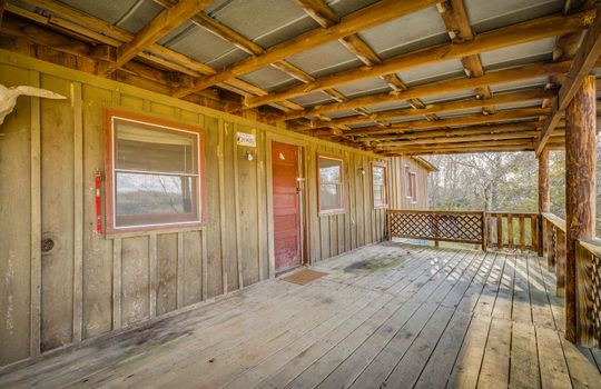 wood cabin, front porch, covered front porch
